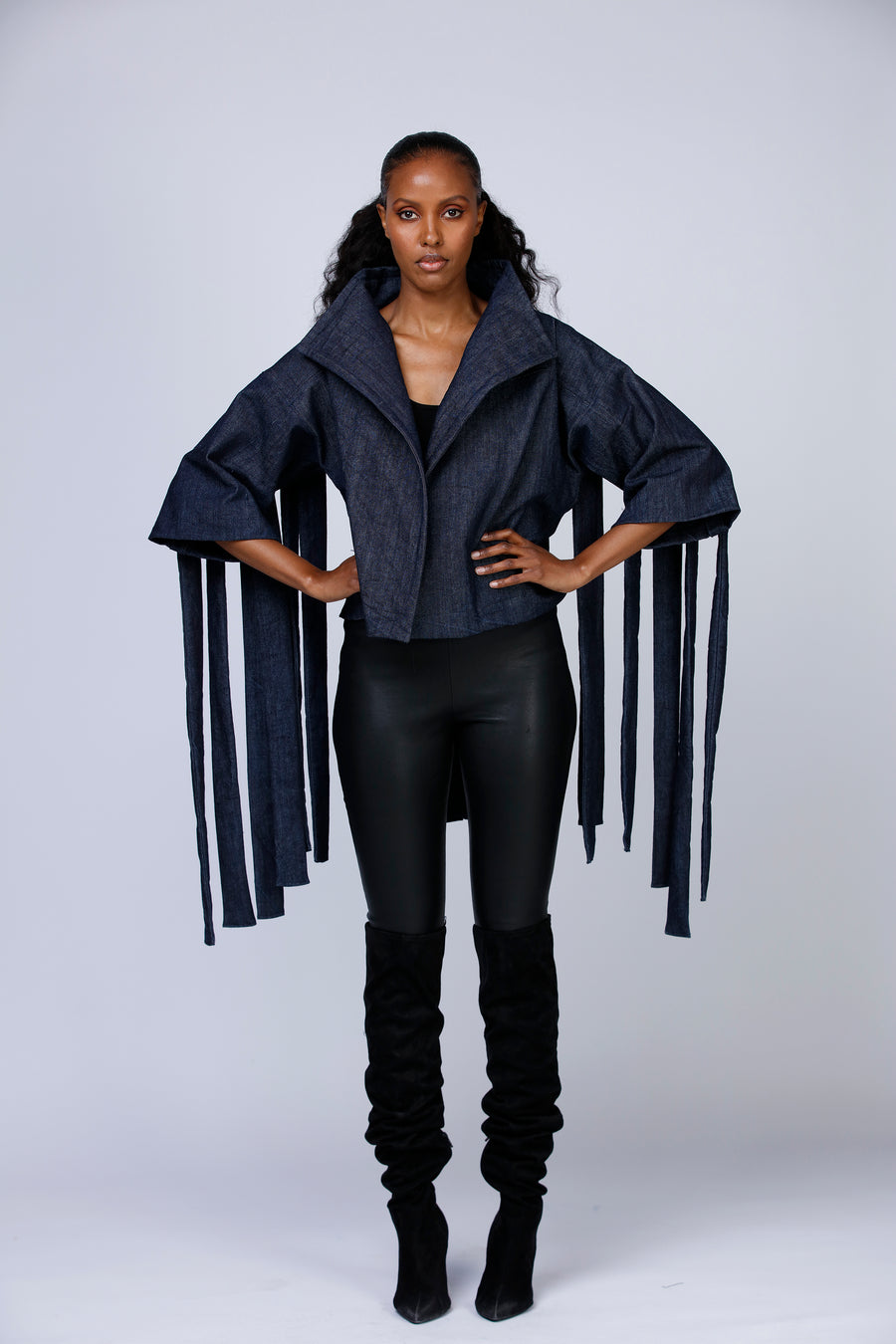 Dark blue denim jacket with detachable fringes. Front.