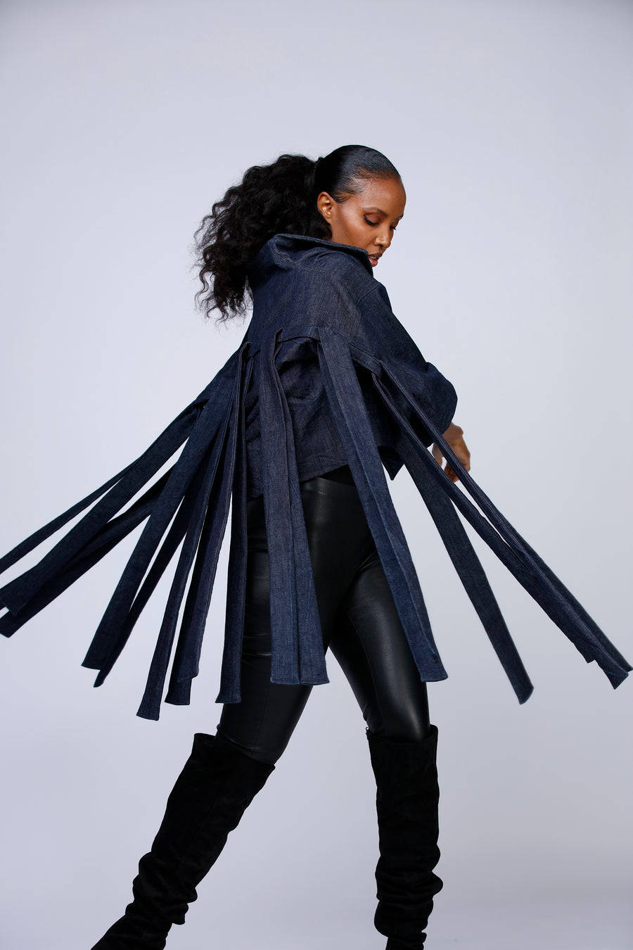 Fringe jacket in dark blue denim. Perfect to channel your inner rock star. Sustainable fashion made from left-over fabric. Responisbly made in Sweden.